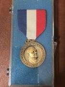 DeKalb, IA high school music association and Hoover trail medallions