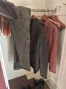 Carhartt size medium Coats overalls and two pair of muck boots men’s seven and eight - these items do come from a smoking home