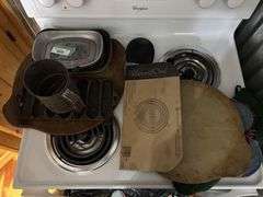 Heavy pewter trays, pampered chef baking pans, antique cast iron corn bread mold and antique four sifter
