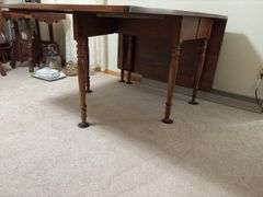 Kraus Furniture Amana walnut gate leg drop leaf dining table 45 x 60 with (3) 12" leaves, table pads, turned legs.