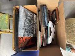 Two boxes of artwork