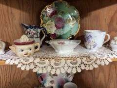 Handpainted china, berry set, juice reamer, pitchers, chamber pot, and more