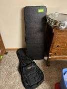 Vic Firth snare drum, soft guitar case and rectangular instrument hardcase