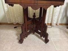 Antique Eastlake style marble top walnut parlor table with original porcelain casters 22 x 30 Per Seller inventory, top was cut from the countertop of old Norway bank