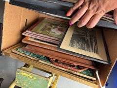 Two boxes of artwork