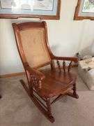Kraus Furniture Amana  solid walnut arm rocker, solid seat cane back
