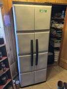 Double door plastic storage cupboard and contents - mostly blankets and linens