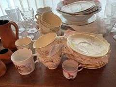 Small knee hole desk and assorted stemware, dishes etc...
