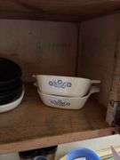 Plastic mixing bowls with lids, dishes, drawer of flatware, glassware, small CorningWare casseroles, etc