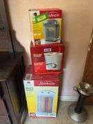 Sunbeam large room heater, Sunbeam small room heater and ReliOn warm mist humidifier