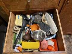 Contents of wardrobe includes 4th of July decor and many vintage kitchen utensils
