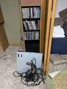 Panasonic DVD/CD player and CDs and storage tower