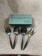 Various flatware and serving spoons