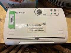 Food saver sealer, bag of sealer bags and steak plates