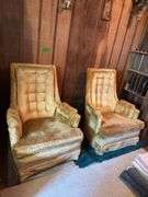 Pair of gold stationary chairs