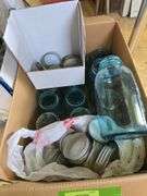 Box of blue canning jars of various sizes