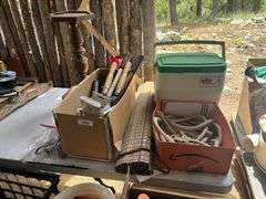 Misc treasures - hummingbird feeder, garden tools, rope, cooler, small propane tanks