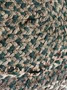 63x52 braided rug, see photos for condition Couple small holes
