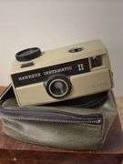 Box camera, binoculars, old radio, view master slides of national parks etc..