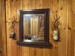 Decorative do-dads, includes wall mirror and sconces