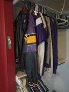 Large assortment of Minnesota Vikings clothing, some still with tags - these all have been in a smoking home