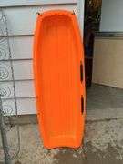 2 plastic sleds
