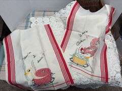 Crocheted table cloth and handiwork towels