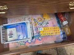 Small dresser, full of painting supplies