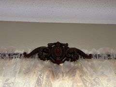 80" antique curtain rod and modern lace curtains