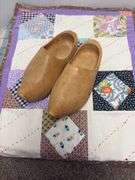 Wooden Dutch shoes and hand sewn doll quilt