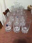 2 apple jars, glasses, early pattern glass cream & sugar, fan basket, pitcher and glasses set