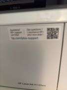 Two drawer letter file cabinet, HP LaserJet M140we printer and plastic stackable baskets