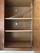 36" base cabinet and 36" double door wall cabinet and small white shelf unit  Bring a screw gun