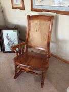 Kraus Furniture Amana  solid walnut arm rocker, solid seat cane back