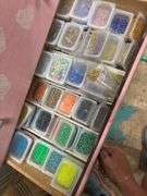Five drawer pink dresser, full of beading supplies and jewelry making items