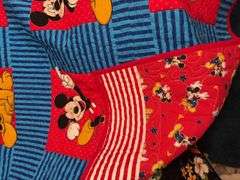 Two machine stitched quilts-44x50 and 42x52