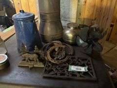 Stove top essentials - trivet, enamel coffee pot, stove fan, stocking holder, horse shoes