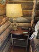 Nightstand, table lamp, painted gold pan, and side chair