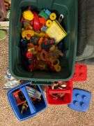 Tote of various toys from the 90's ish