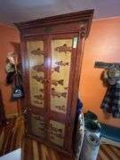 Large and very heavy armoire with fish print - 37 x 22.5 x 86, solid shelves were added in place of the open area for a TV