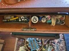 Singer elec sewing machine in stand and sewing notions
