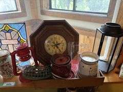 Decorative rocks and shells, stained glass, clock, candles and candle warmers