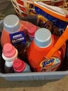 Lots of laundry soap, grime boss floor sweeper and laundry basket