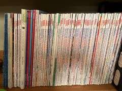 3 shelves of books and magazines Please see photos
