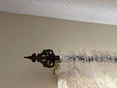 80" antique curtain rod and modern lace curtains