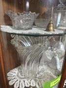 All in china cabinet includes glass bells, vases,  pitcher, hand painted bowls and more