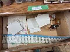 Small dresser, full of painting supplies