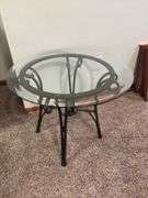 26" round glass top wrought iron leg table