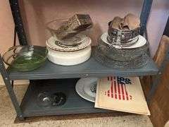 Contents of metal shelf and two other shelves-snack sets, cookie jar, S&P’s, vases, books, record albums, etc