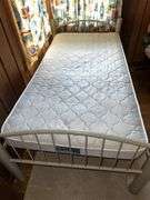 Twin size metal bed with Serta Bristol mattress and linens Very clean!!